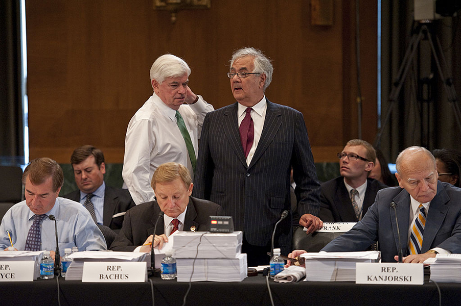 House Financial Services Chairman Barney Frank, D-Mass., standing, consults with Senate Banking Chairman Christopher J. Dodd, D-Conn., during the House-Senate conference on a comprehensive financial regulatory overhaul bill.