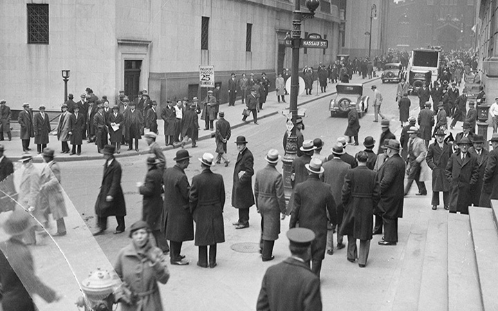 Crowds gather on Wall Street as banks reopened on March 13, 1933, after the Bank Holiday.