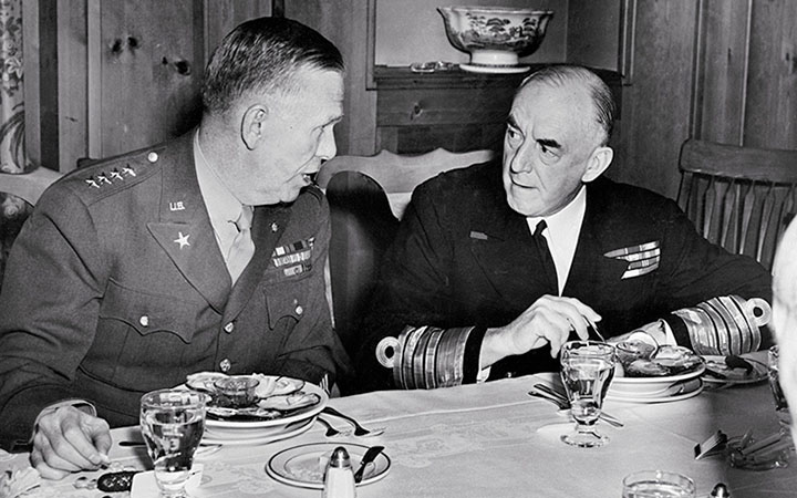U.S. Army Chief of Staff George C. Marshall and British Admiral Sir Dudley Pound talk at luncheon held for British and American naval chiefs at the Federal Reserve building in Washington, D.C.,&nbsp;January 17, 1942