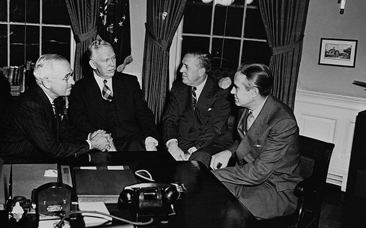 President Harry Truman meets with George Marshall, Economic Cooperation Administration chief Paul Hoffman, and ECA roving ambassador W. Averell Harriman to discuss the Marshall Plan.