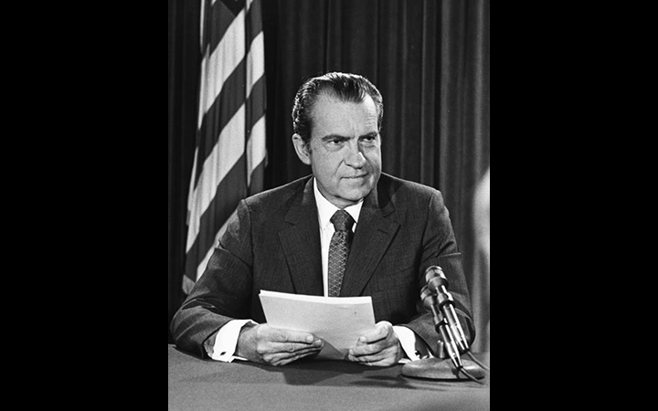 President Nixon prepares to announce new economic policies on a television broadcast.