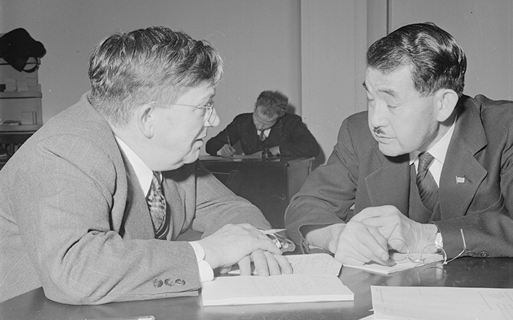 This photo was captioned "A business man of Japanese ancestry confers with a representative of the Federal Reserve Bank at Wartime Civil Control Administration station to arrange disposition of his financial affairs prior to evacuation." National Archives and Records Administration Photograph No. <a href="https://catalog.archives.gov/id/536054">210-G-A79</a>, Central Photographic File of the War Relocation Authority, 1942 – 1945; Record Group 210: Records of the War Relocation Authority, 1941-1989.